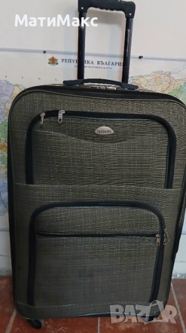 Куфар голям с дръжка на колела