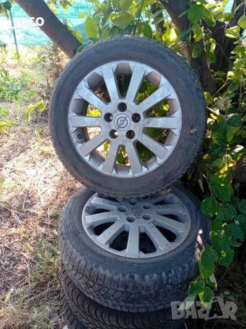 оригинални джанти с гуми за опел , снимка 2 - Гуми и джанти - 50645319