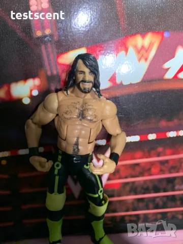 Екшън фигура WWE Seth Rollins Сет Ролинс Mattel Elite figure играчка neon yellow & black, снимка 2 - Колекции - 49152214