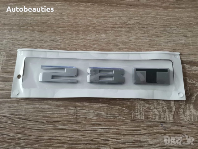 сребристо лого Cadillac 28T