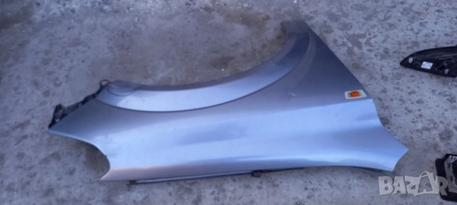 Десен калник Opel Astra H, снимка 2 - Части - 51646332