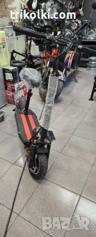 Мощна електрическа тротинетка с амортисьори, километрaж.ж, снимка 16 - Велосипеди - 51027464