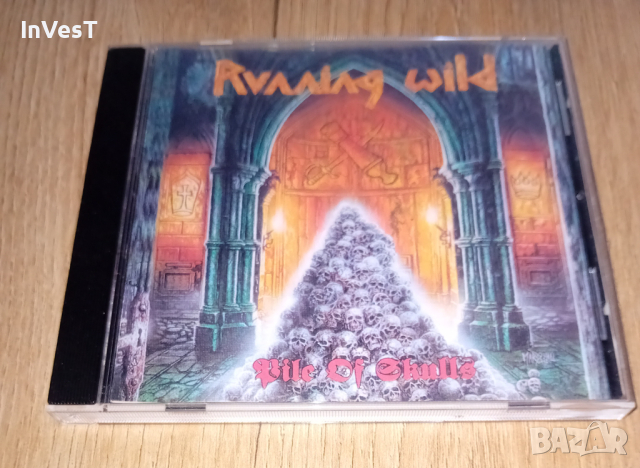 Диск на Running Wild - Pile Of Skulls, снимка 1 - CD дискове - 44948708