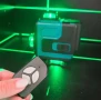 Самонивелиращ Лазерен Нивелир 4D с 16 Линиии Зелен Лазер и Тринога в Куфар, снимка 5
