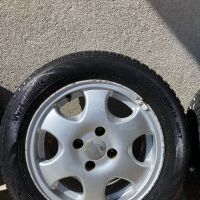 Зимни гуми с алуминиеви джанти 185/65/14, снимка 2 - Гуми и джанти - 45491971