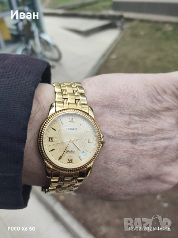 позлатен швейцарски часовник tissot