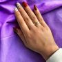 Златист дамски пръстен от медицинска стомана с интригуващи гравирани декорации, снимка 1 - Пръстени - 45469425