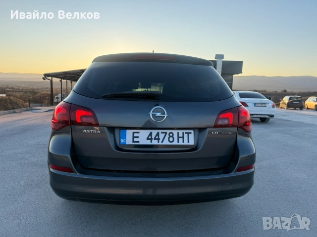 Opel Astra J Sport turner , снимка 8 - Автомобили и джипове - 53740489