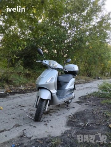 Скутер piaggio fly 125