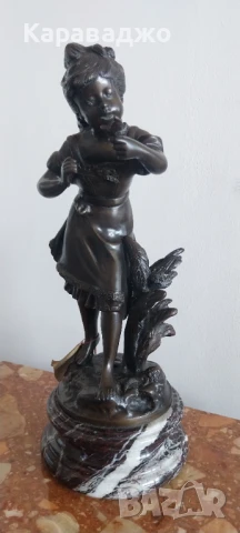 Бронзова Статуетка