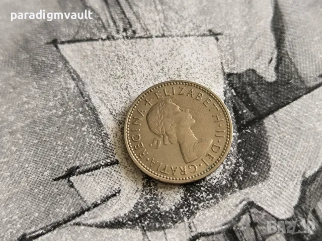 Монета - Великобритания - 1 шилинг | 1961г., снимка 2 - Нумизматика и бонистика - 50240325