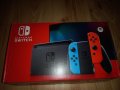 Nintendo Switch - Red & Blue + 2 Games
