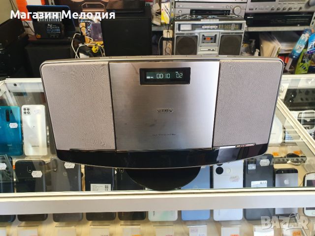 Аудиосистема Philips BTM2056 със вградени колони. Има радио, диск, usb и bluetooth. Има дистанционно