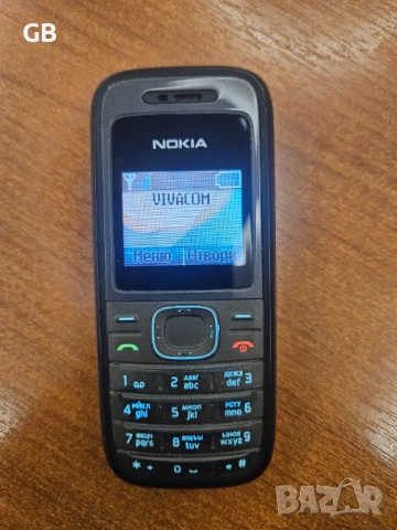 Nokia 1208 с оригинално зарядно + кожено калъфче