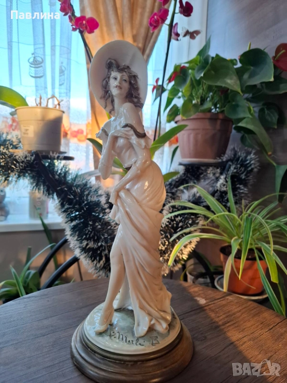 Статуетка на Мерли, снимка 1