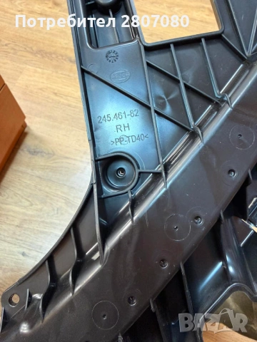 1812093-00-A; Държач под фар десен Tesla Model Y/Tesla Model 3