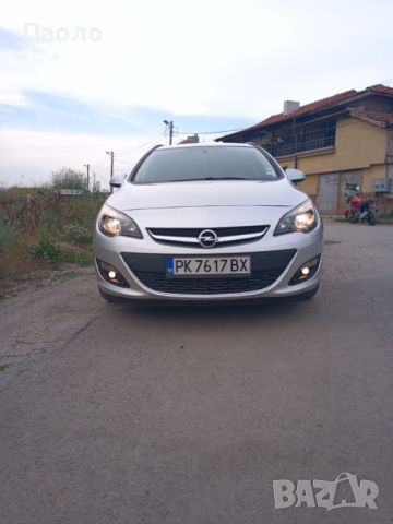 Opel Astra J Sports Tourer , снимка 1 - Автомобили и джипове - 46626370