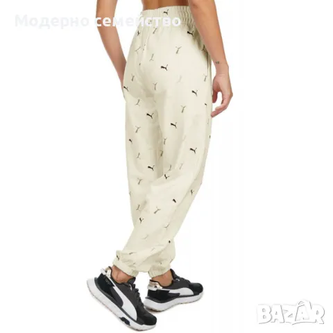 Дамско спортно долнище PUMA Classics Graphic All Over Printed Pants Black - L, снимка 1 - Спортни екипи - 46908448