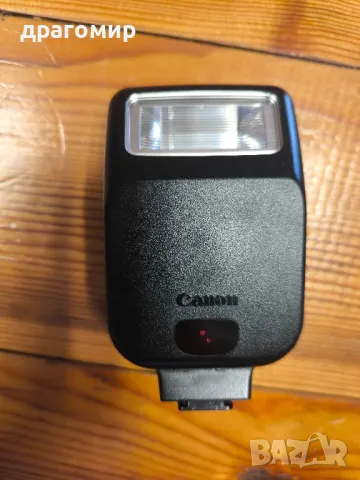 Canon speedlite 200E, снимка 2 - Светкавици, студийно осветление - 46828881