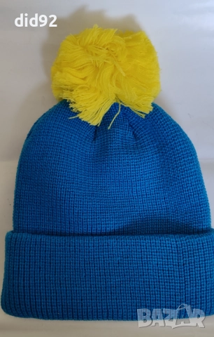 Зимна шапка с пискюл – синя с жълт пух