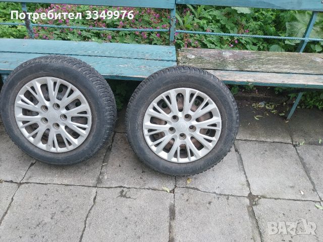 Продавам железни джанти със зимни гуми и оригинални тасове за кия сийд 15ки., снимка 1 - Гуми и джанти - 46269358