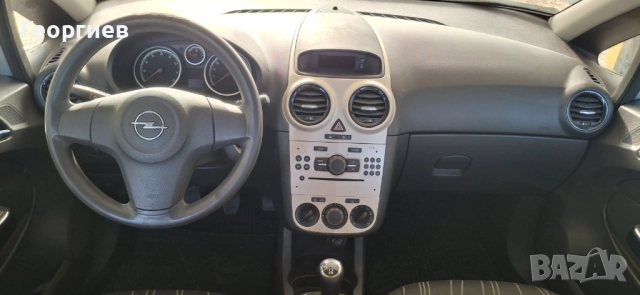 Opel Corsa Enjoy 1.2i 80PS, снимка 9 - Автомобили и джипове - 51646203