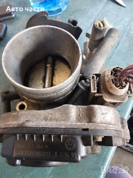 дросел за въздух VWAG 06A133064H 408.237/111/017 2.0 1725

, снимка 1