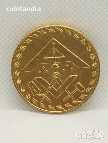 позлатена масонска монета