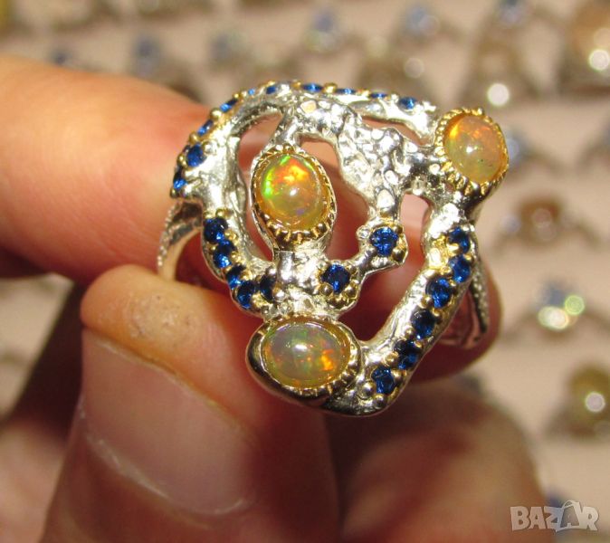 925 сребърен пръстен с етиопски опал, размер на камъка 4x3мм, общо тегло 4.9гр., снимка 1