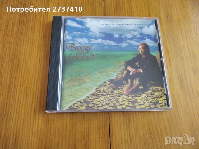 MIKE & THE MECHANICS - BEGGAR ON A BEACH OF GOLD 10лв оригинален диск, снимка 1 - CD дискове - 45287632
