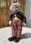 Порцеланова музикална кукла- клоун , снимка 1 - Музикални играчки - 45567013