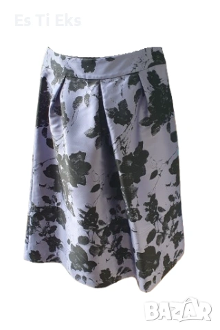 Елегантена пола на цветя, с разкроена кройка /складови цени/