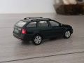 Skoda Octavia Combi Scout - мащаб 1:43 на Abrex моделът е нов в PVC дисплей-кейс, снимка 4