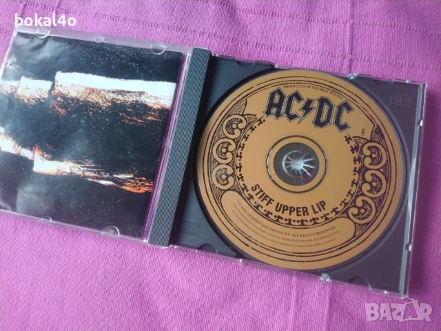 AC/DC - Stiff Upper Lip, снимка 2 - CD дискове - 44010031