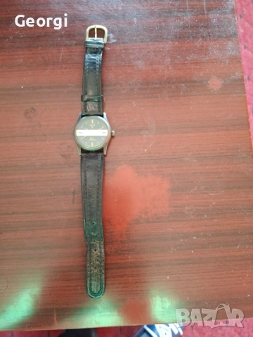 Часовник Q&Q елегантен.