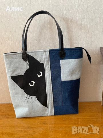 ЛюбопитнаТА котка