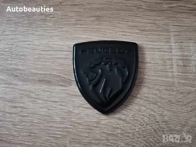 металнa черна емблема Пежо Peugeot с новото лого, снимка 1 - Аксесоари и консумативи - 46391396