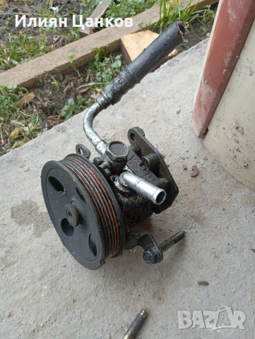 Хидравлична помпа за Нисан Примера П12 2.0 бензин 