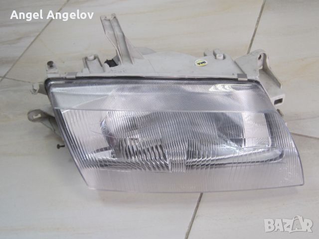 Преден фар TYC 20-5493-08-2 за MAZDA 323 S V Седан PV (BA) H4 1996 - 2003, снимка 1 - Части - 46584404