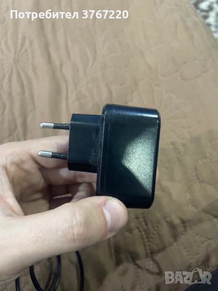 Зарядно устройство за телефон, черно на цвят., снимка 1