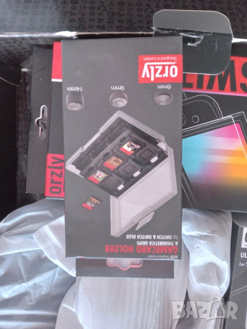 Комплект аксесоари Orzly, съвместим с конзолата Nintendo Switch OLED, снимка 4 - Аксесоари - 51668594
