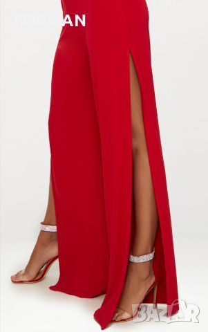 УНИКАЛЕН панталон с отворен встрани широк крачол в червен цвят , снимка 1 - Панталони - 45261905