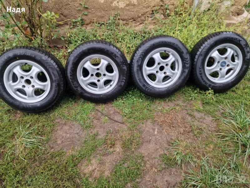 Лети джанти с зимни гуми 4х114.3 Ет 35, снимка 1