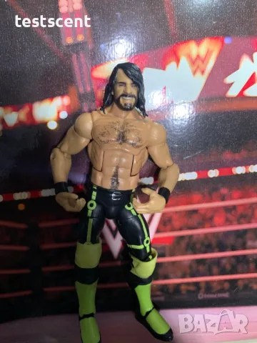 Екшън фигура WWE Seth Rollins Сет Ролинс Mattel Elite figure играчка neon yellow & black, снимка 7 - Колекции - 49152214