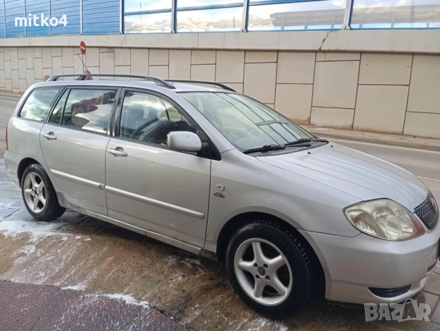 тойота корола 2,0d-4d e12 комби , снимка 13 - Автомобили и джипове - 52598823