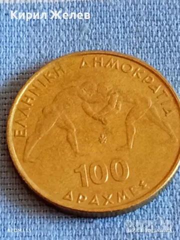 Монета 100 драхми 1999г. Гърция 45 Световно първенство по борба Атина 50190, снимка 3 - Нумизматика и бонистика - 49991939