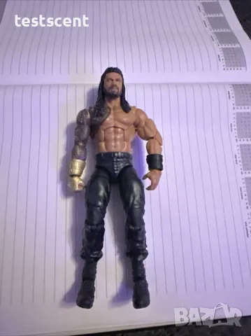 Екшън фигура WWE Roman Reigns Роман Рейнс ELITE SERIES Bloodline mattel figure елит, снимка 4 - Колекции - 48384867