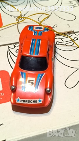 80s with this vintage plastic Porsche 904 GTS remote-controlled toy car, made in Singapore, снимка 5 - Колекции - 53192293