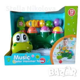 Музикална играчка Крокодил с топчета и чукче, снимка 1