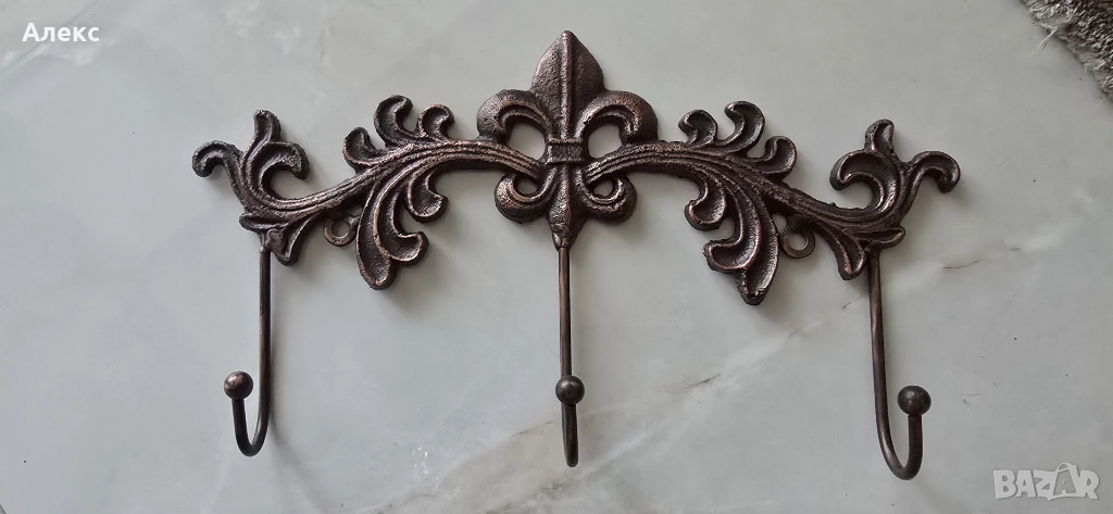 Изящна чугунена закачалка., снимка 1